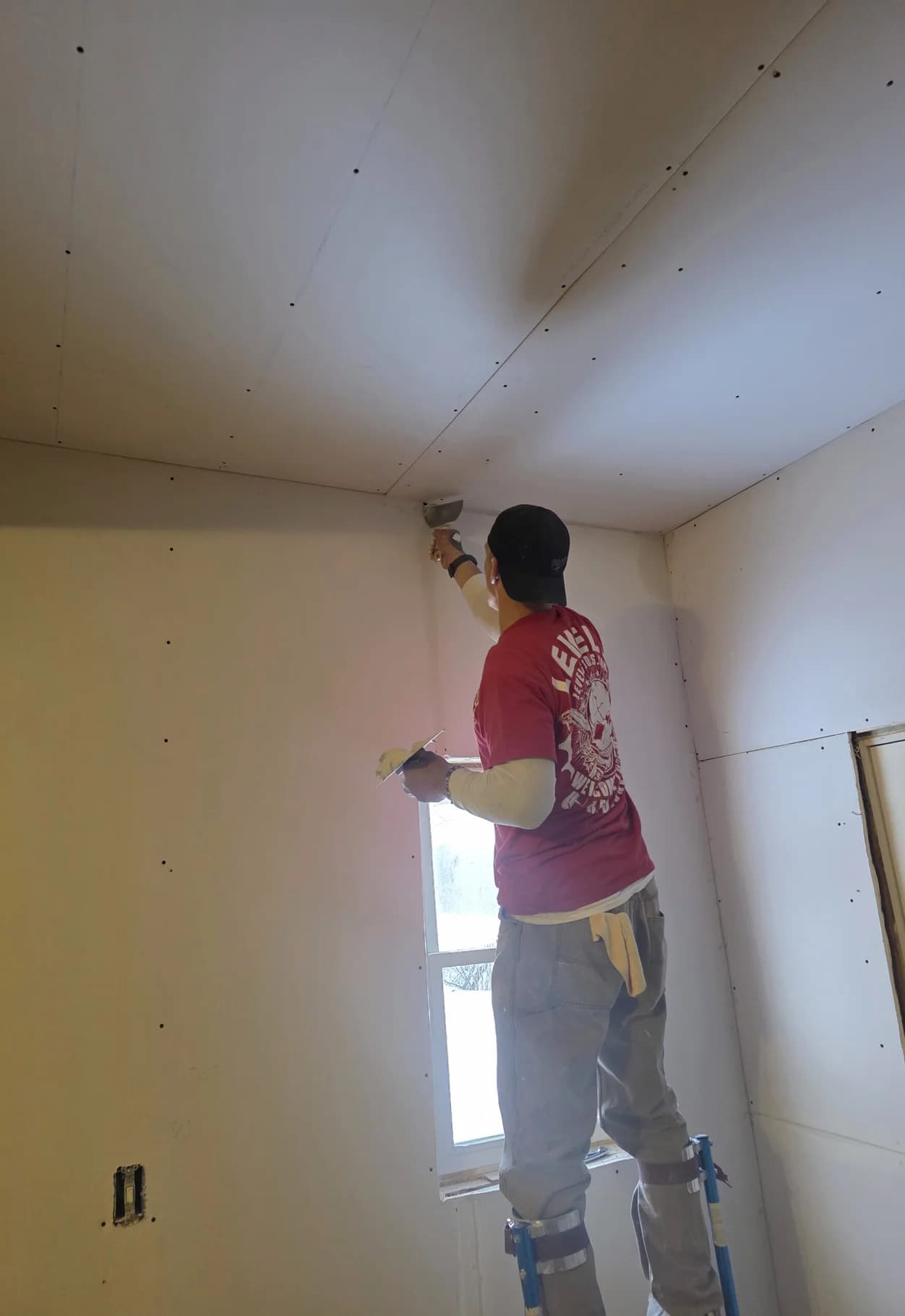 Interior framing and timber posts during a home remodel