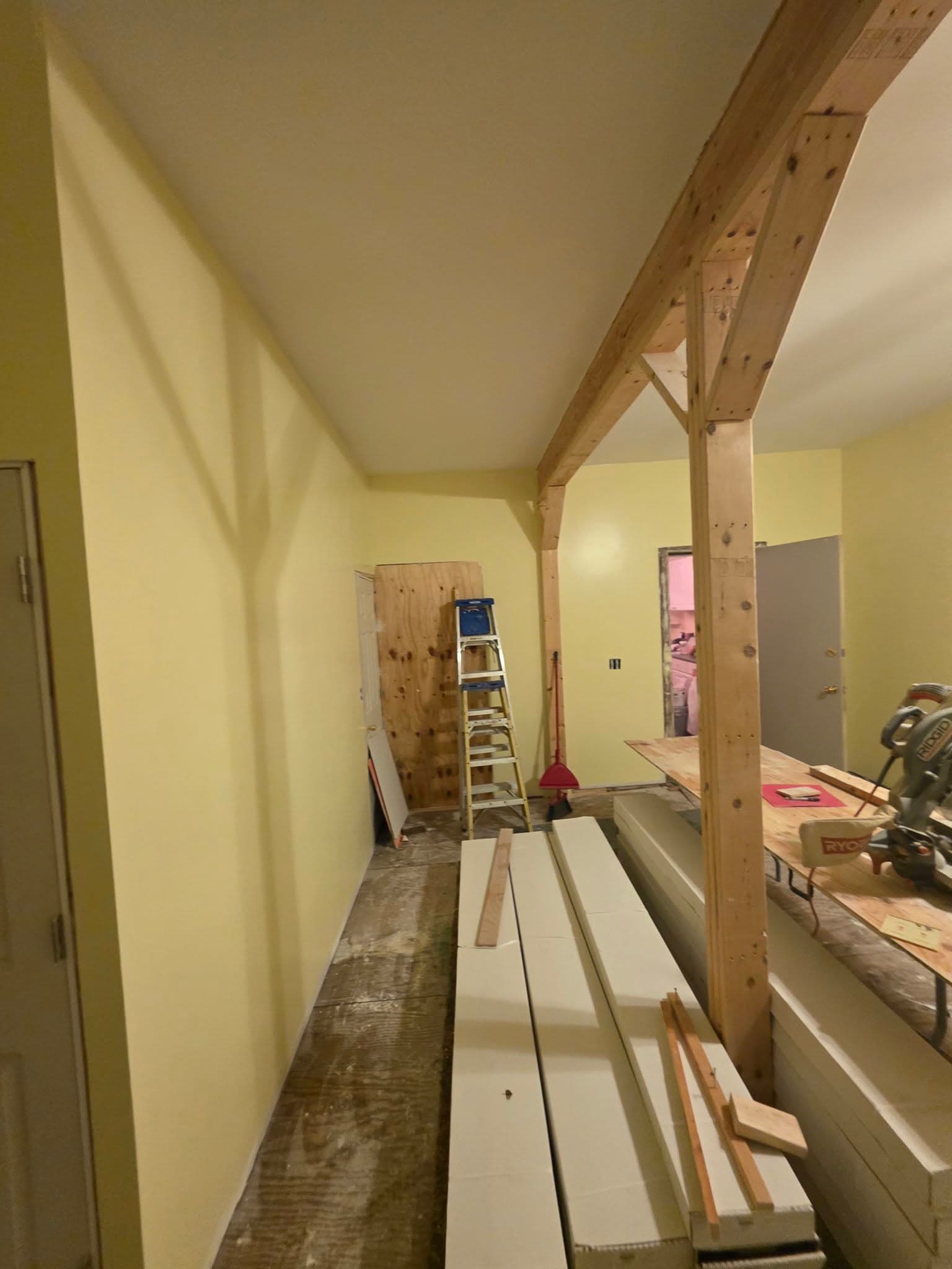 Drywall taping and finishing on newly hung walls and ceiling