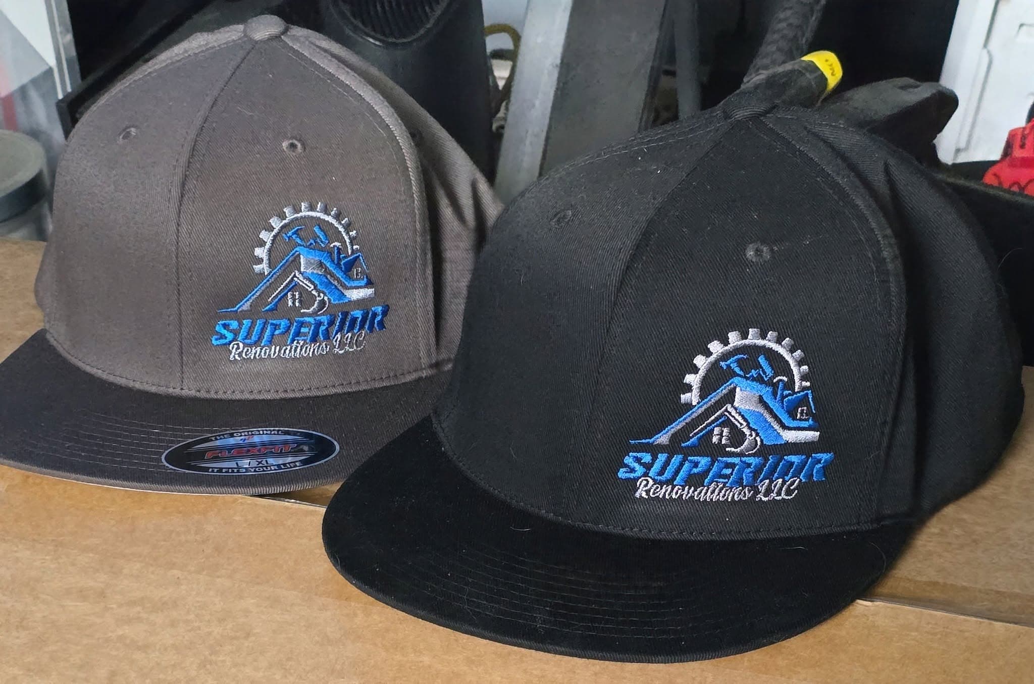 Superior Renovations LLC embroidered hats with the company logo